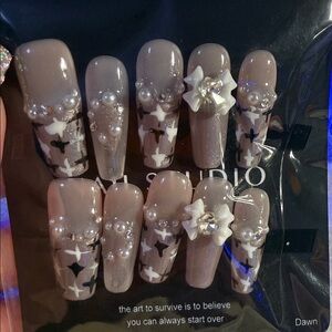 Elegant Pearl and Star Nail Set